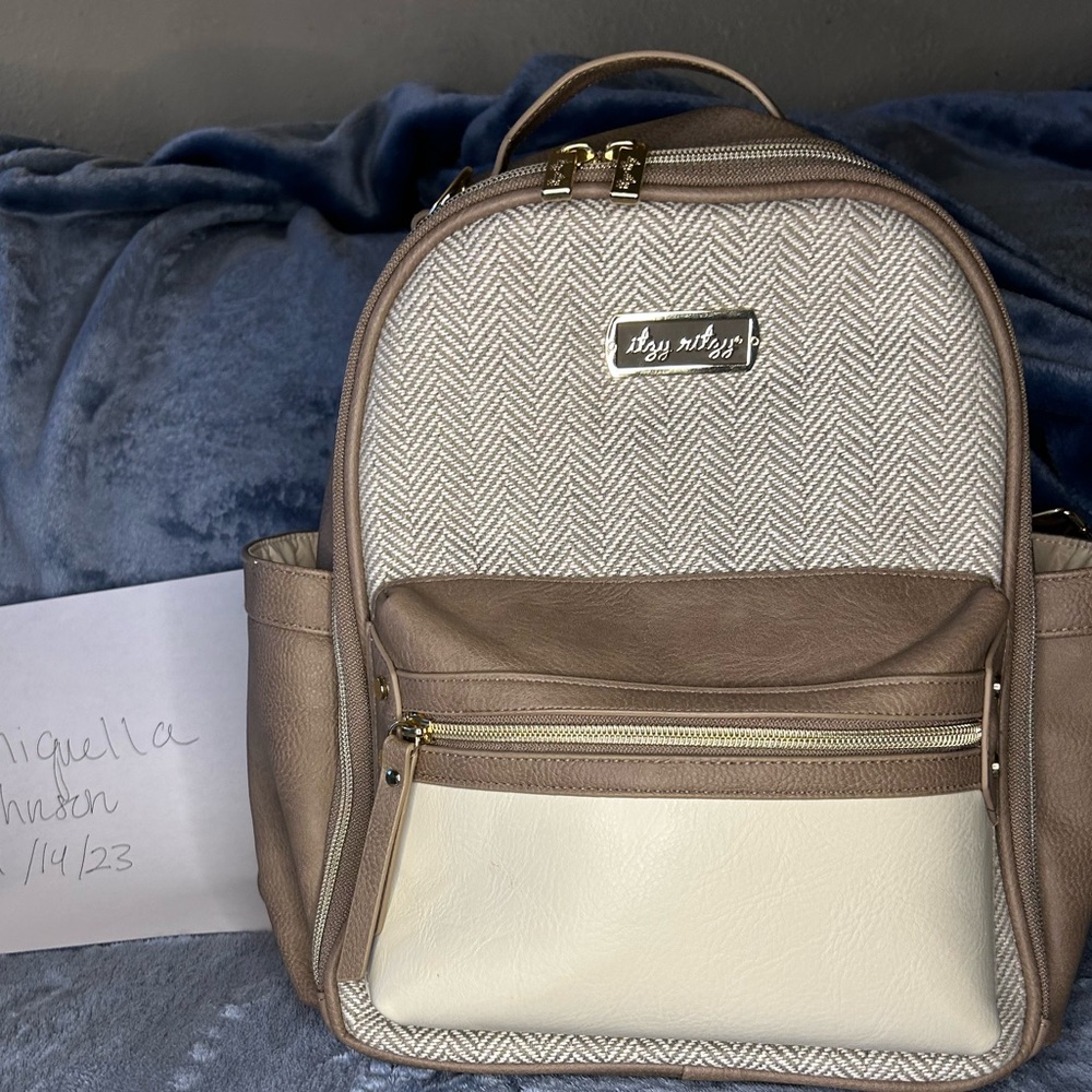 Itzy ritzy vanilla latte mini bag!